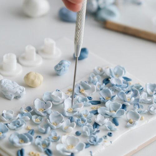 Hand sculpting Blue Blossom Polymer Clay Earrings petals